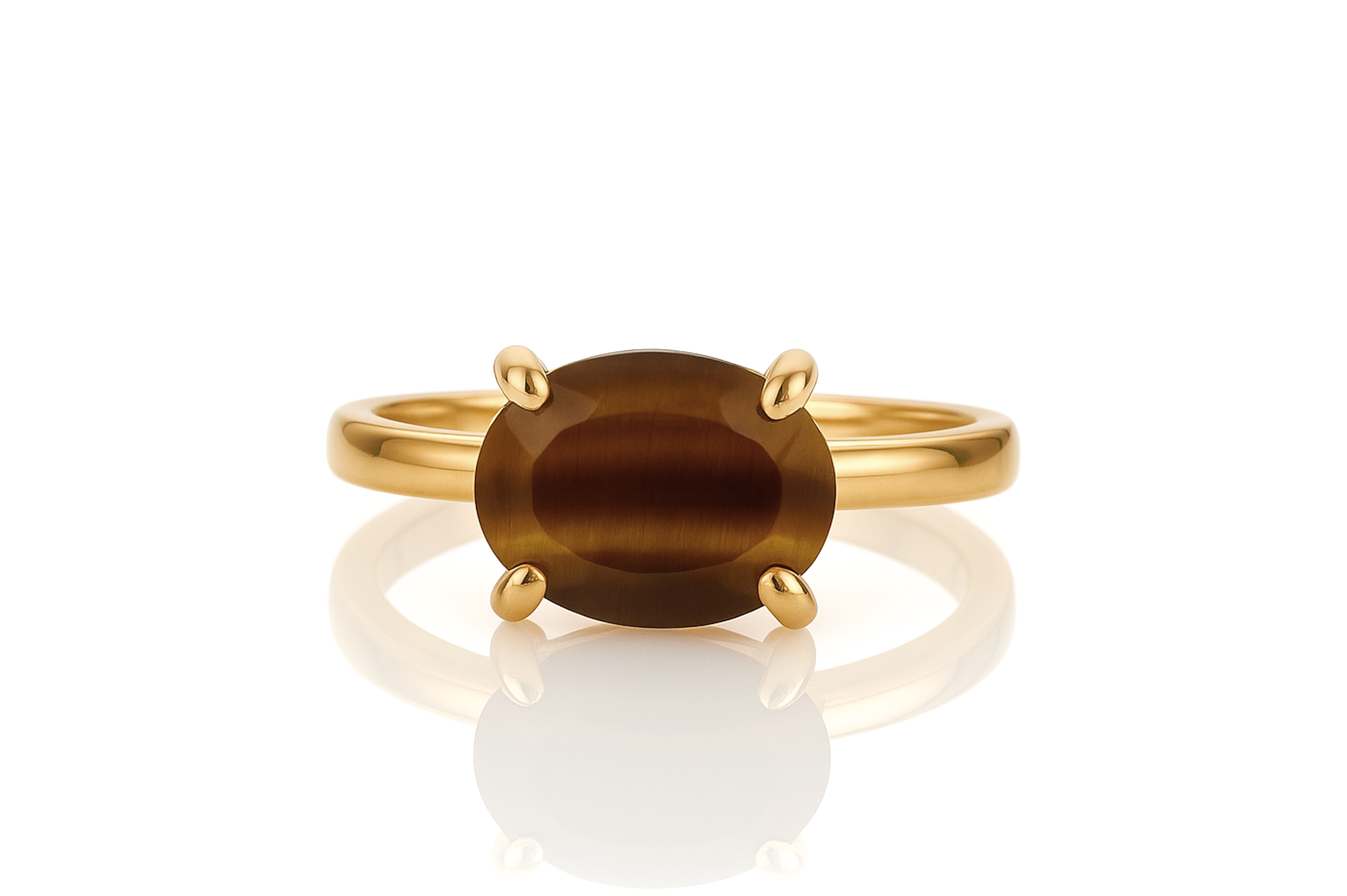 a yellow gold ring with a brown stone