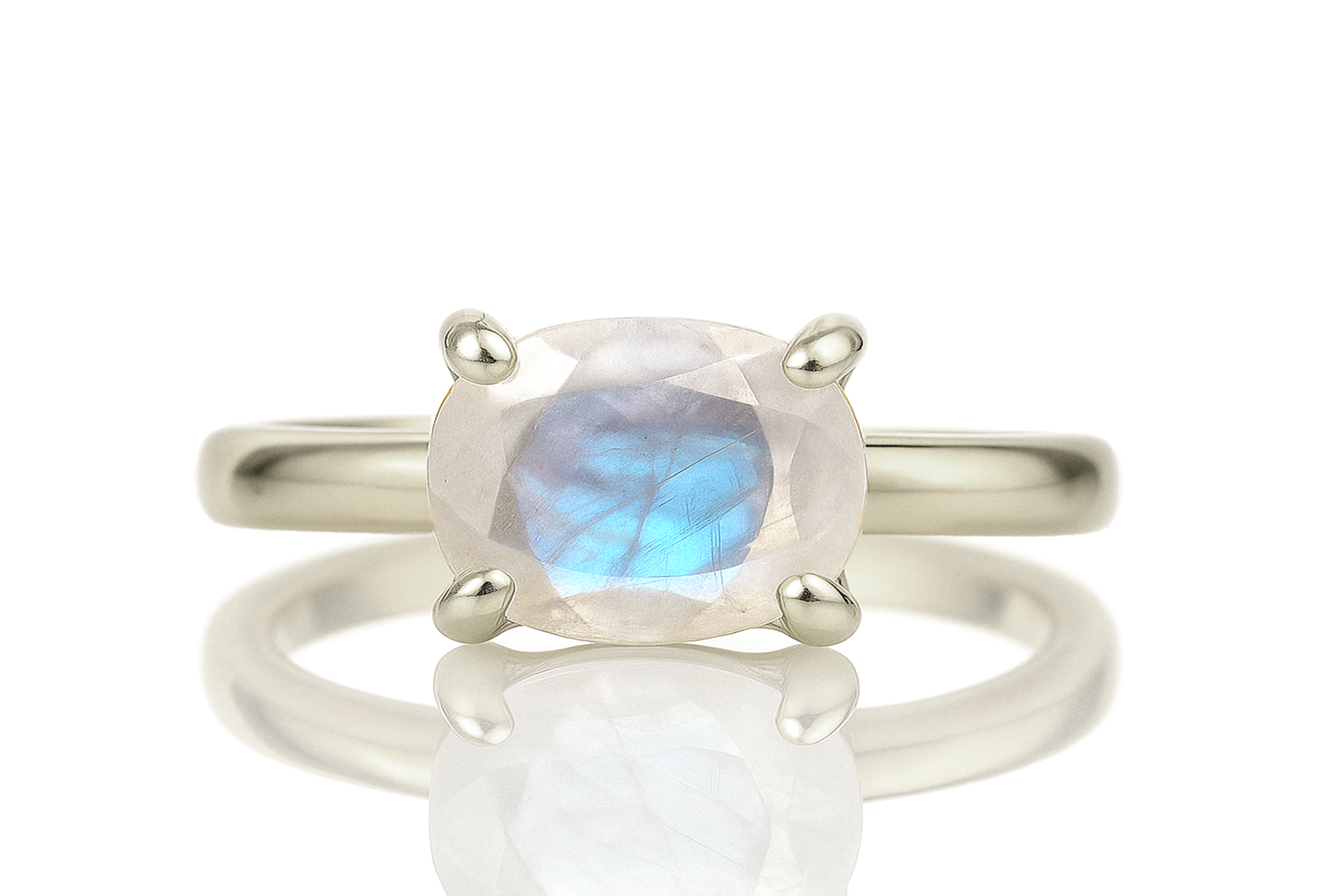 a ring with a blue and white stone in it