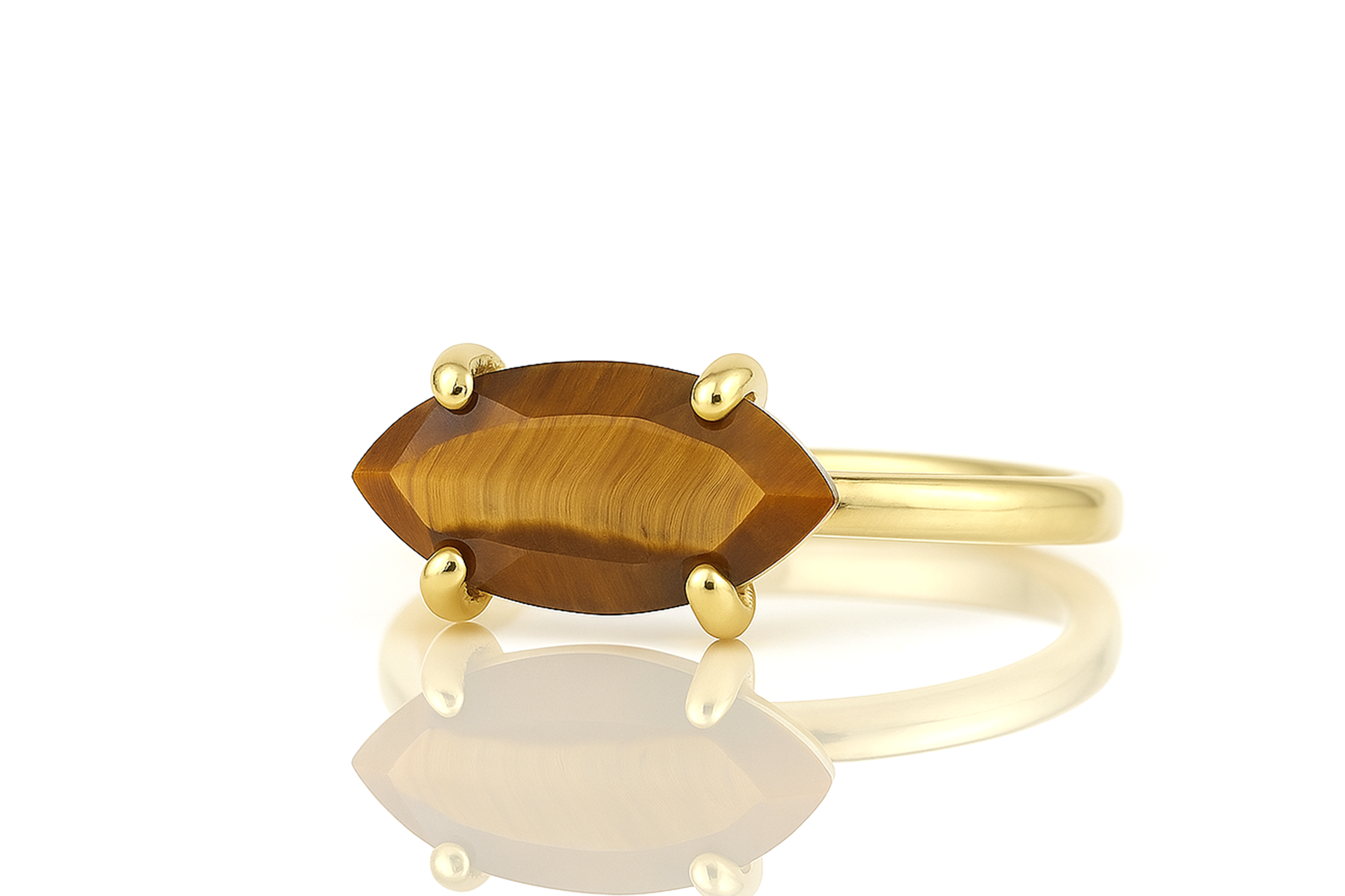 a yellow gold ring with a tiger's eye stone