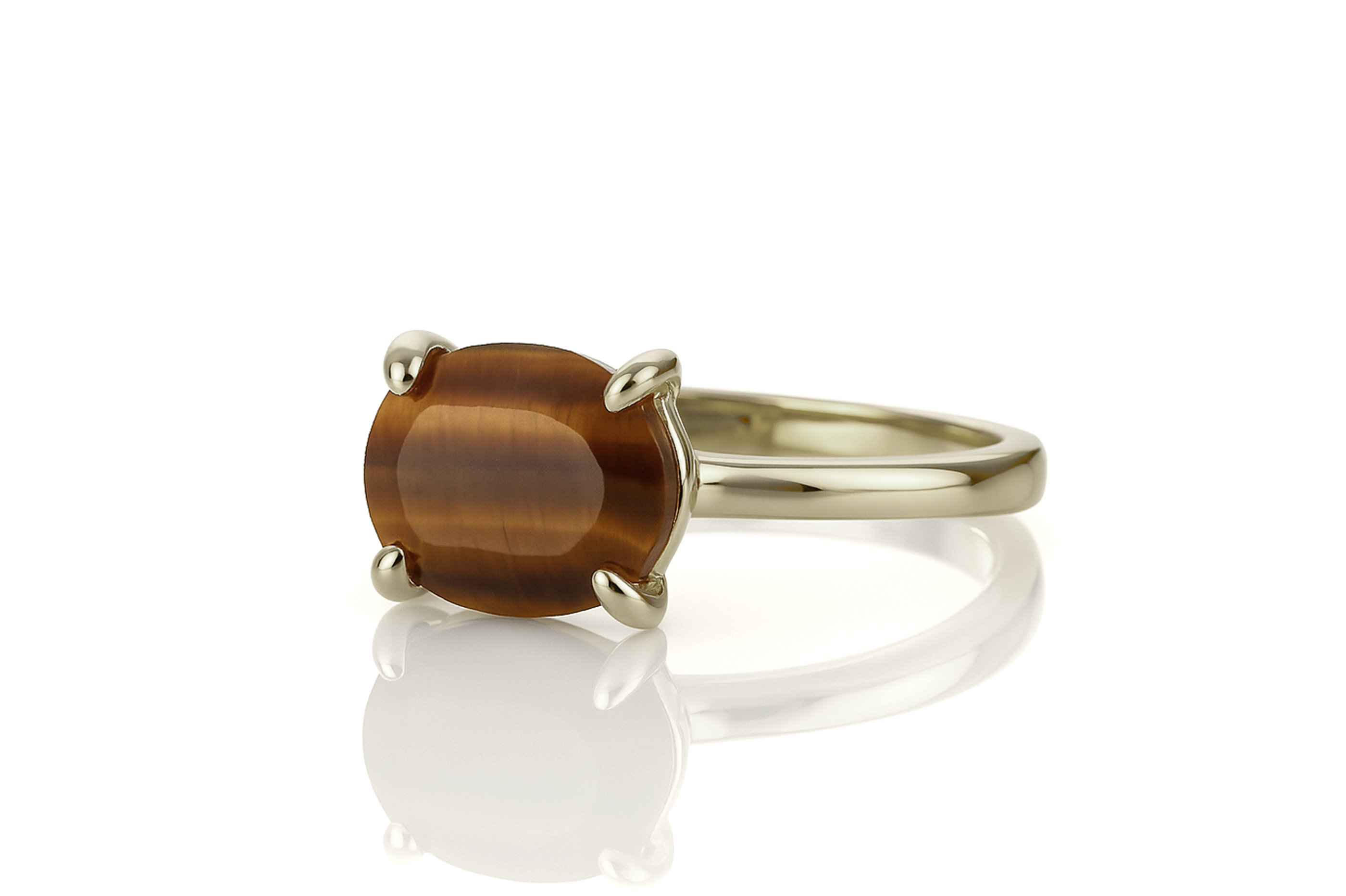 a yellow gold ring with a brown stone