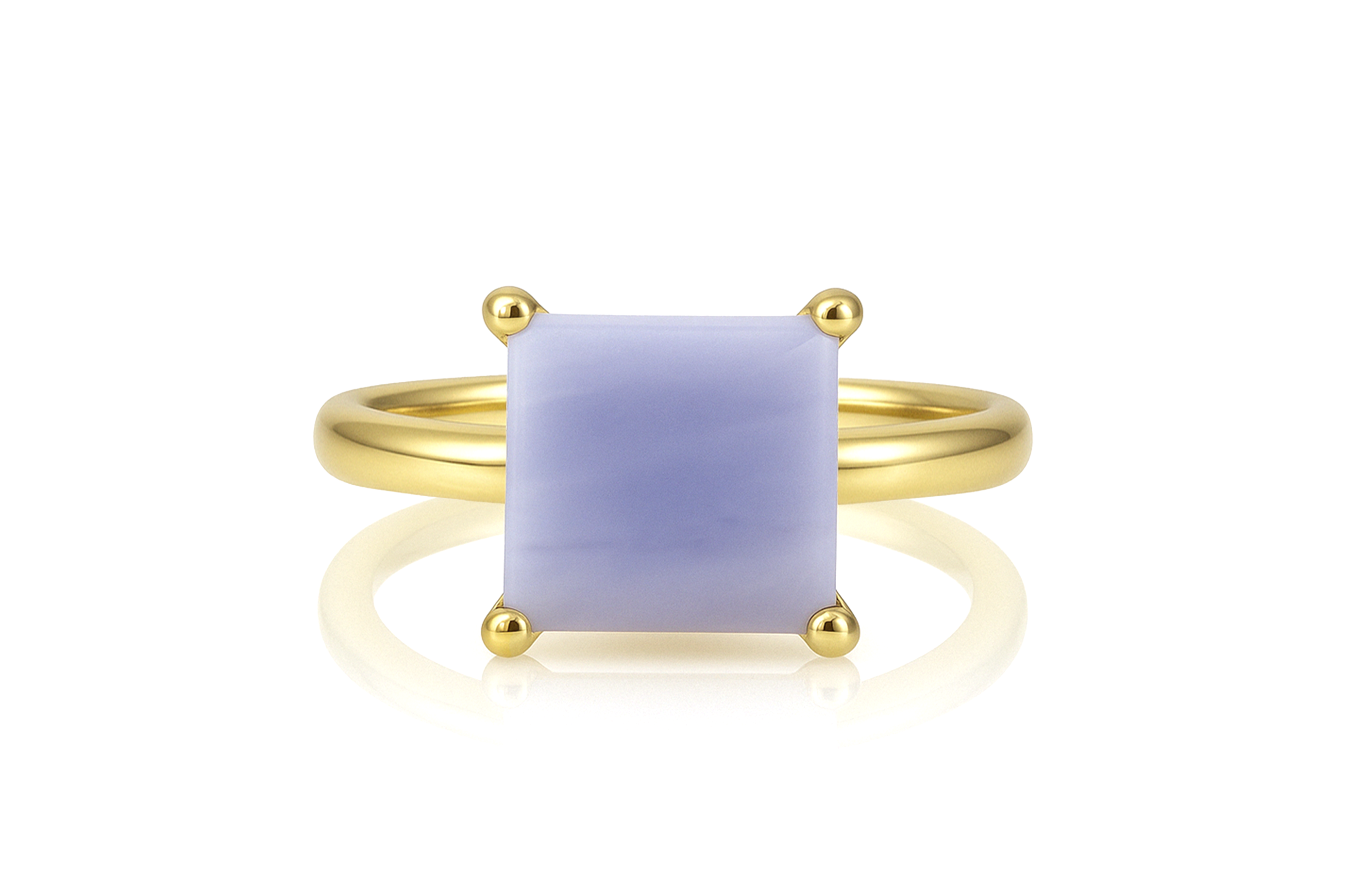 a yellow gold ring with a blue stone