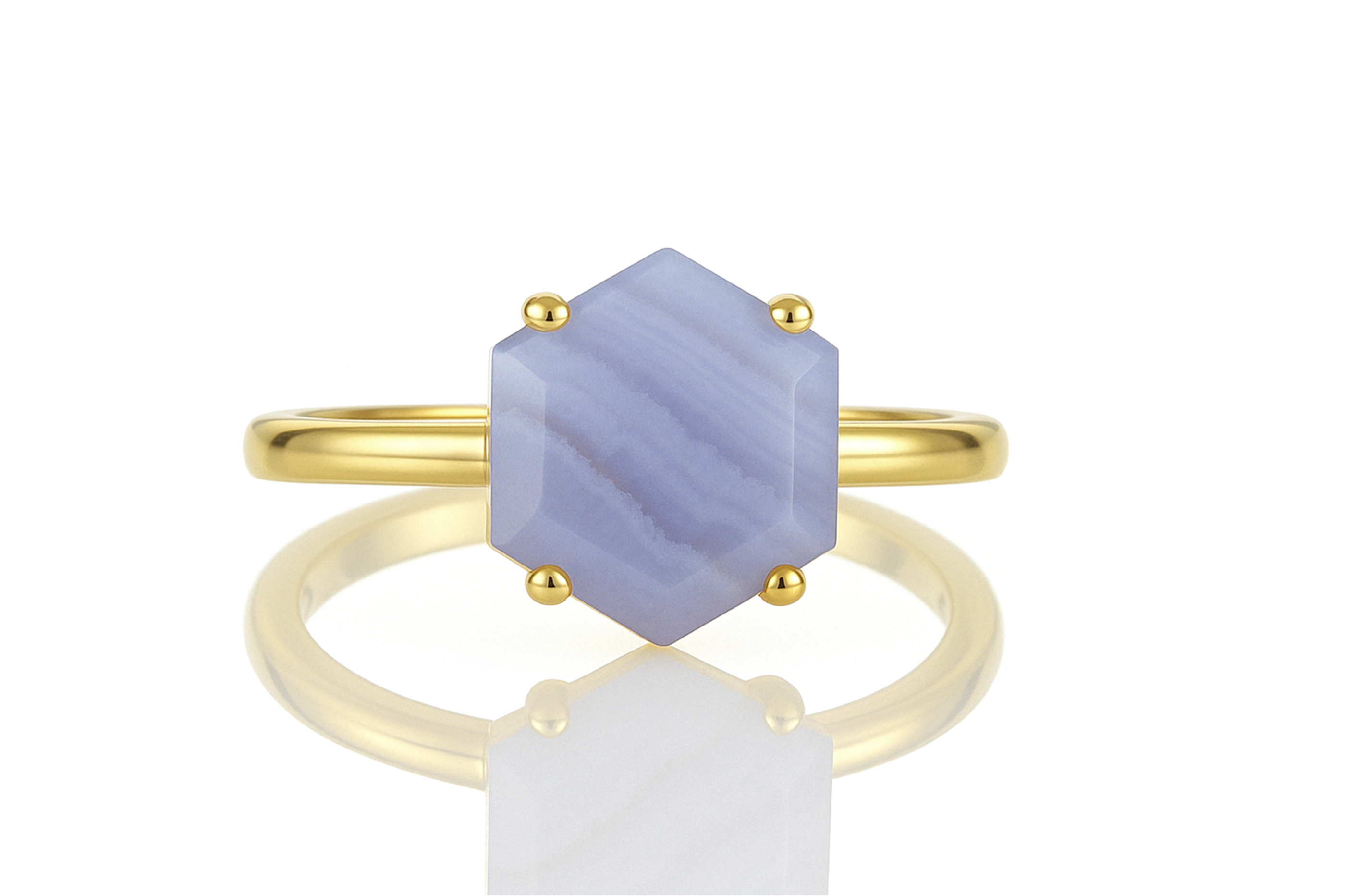 a yellow gold ring with a blue stone