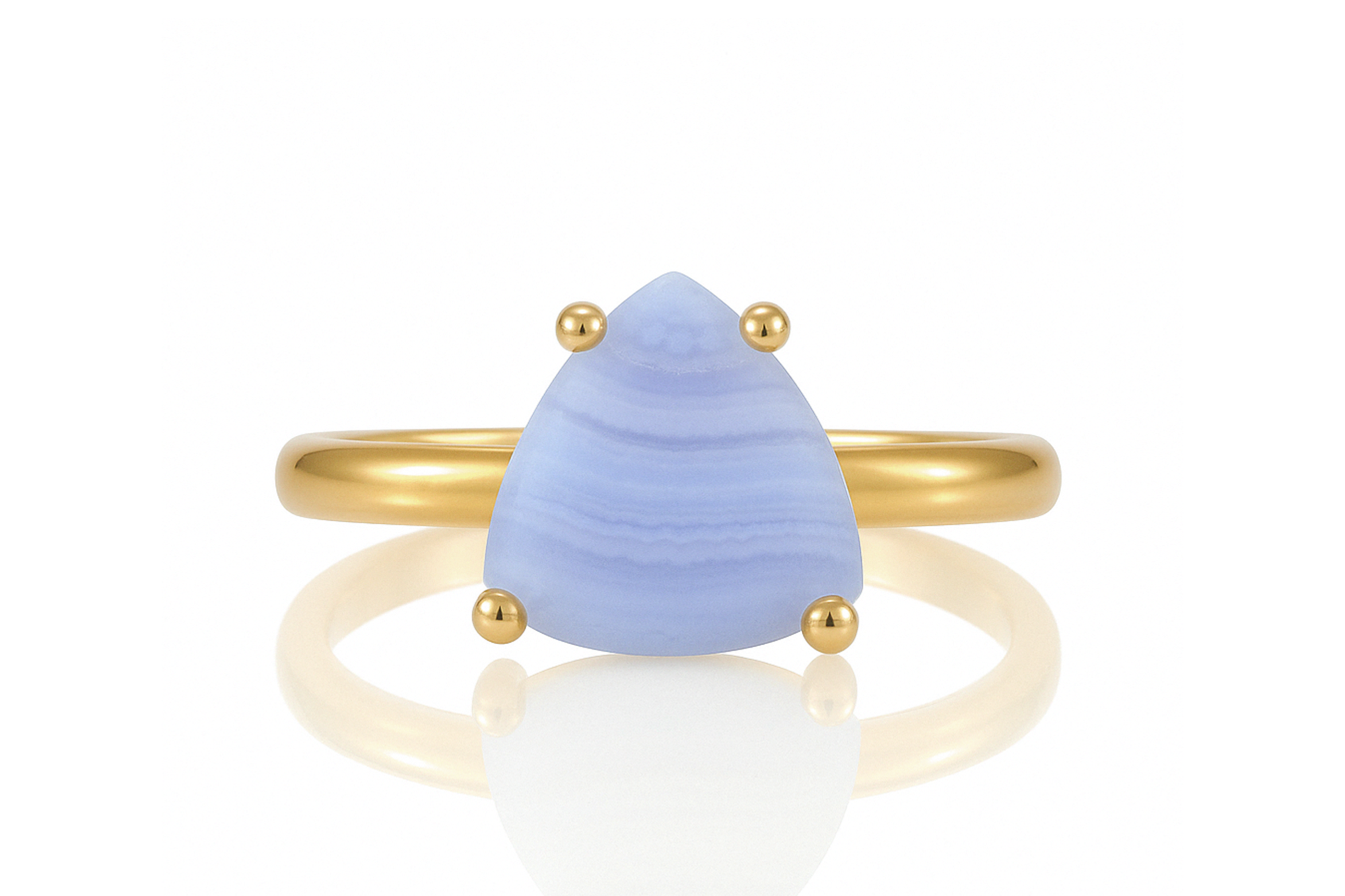a gold ring with a blue stone on it