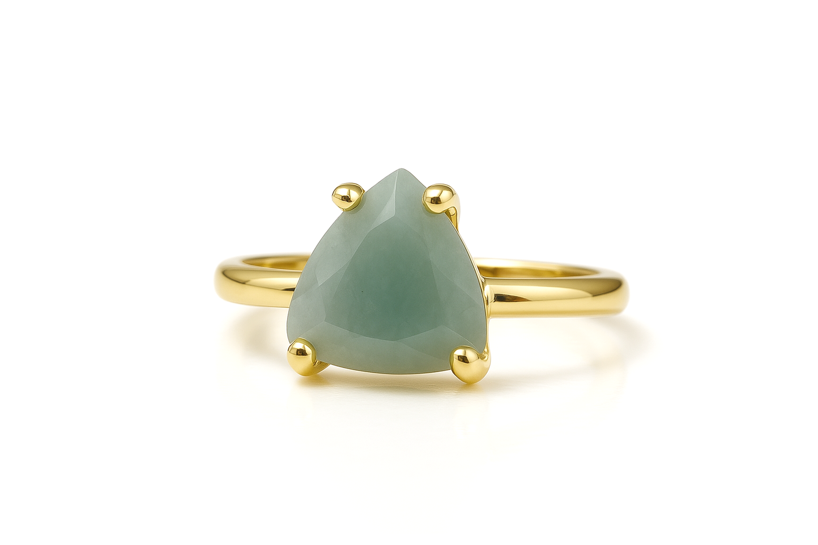 a gold ring with a green stone on it
