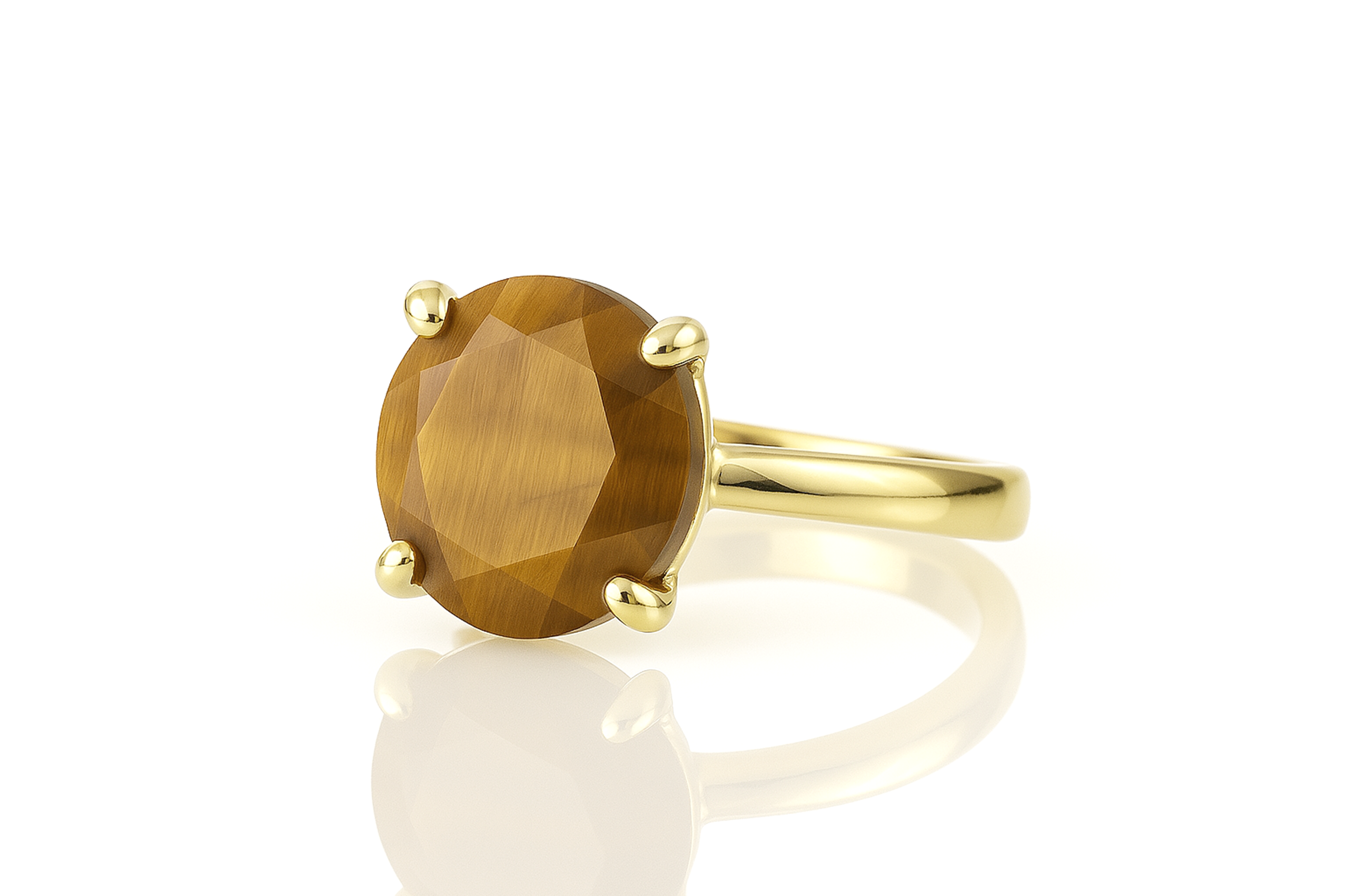 a yellow gold ring with a brown stone