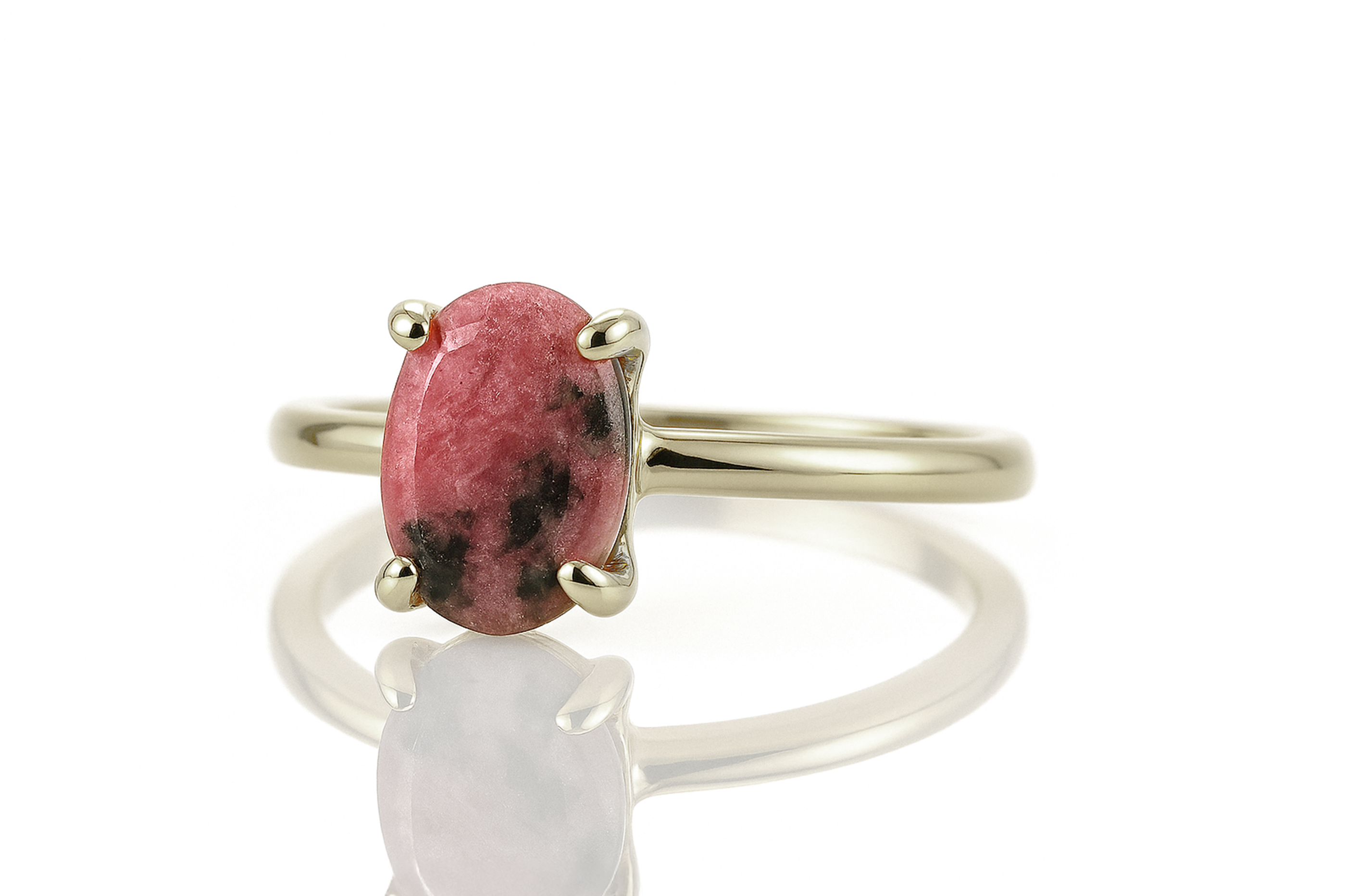 a close up of a ring with a stone