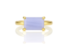 a yellow gold ring with a blue stone