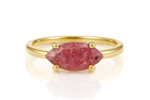 a gold ring with a pink stone on it