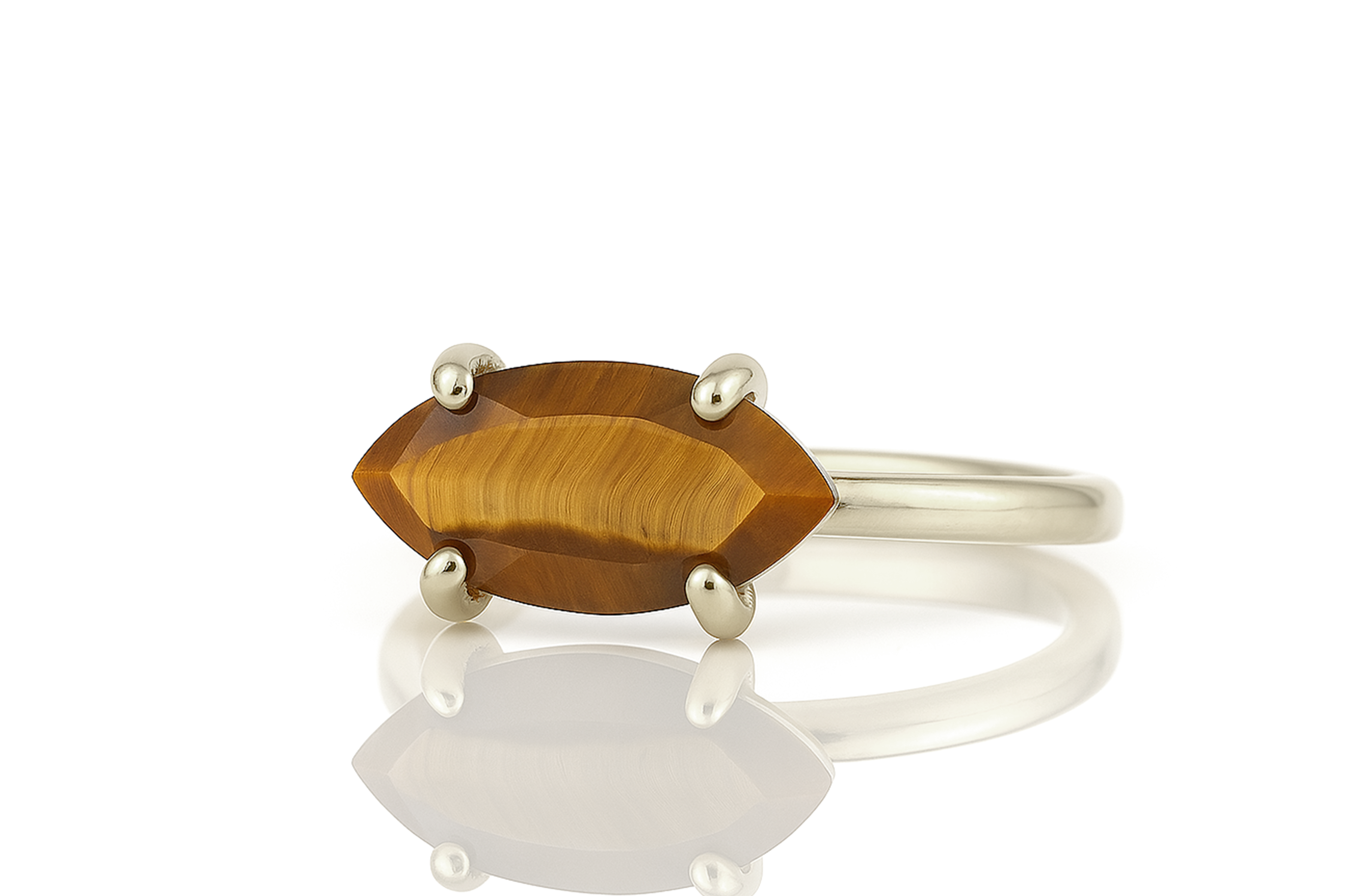 a close up of a ring on a white surface