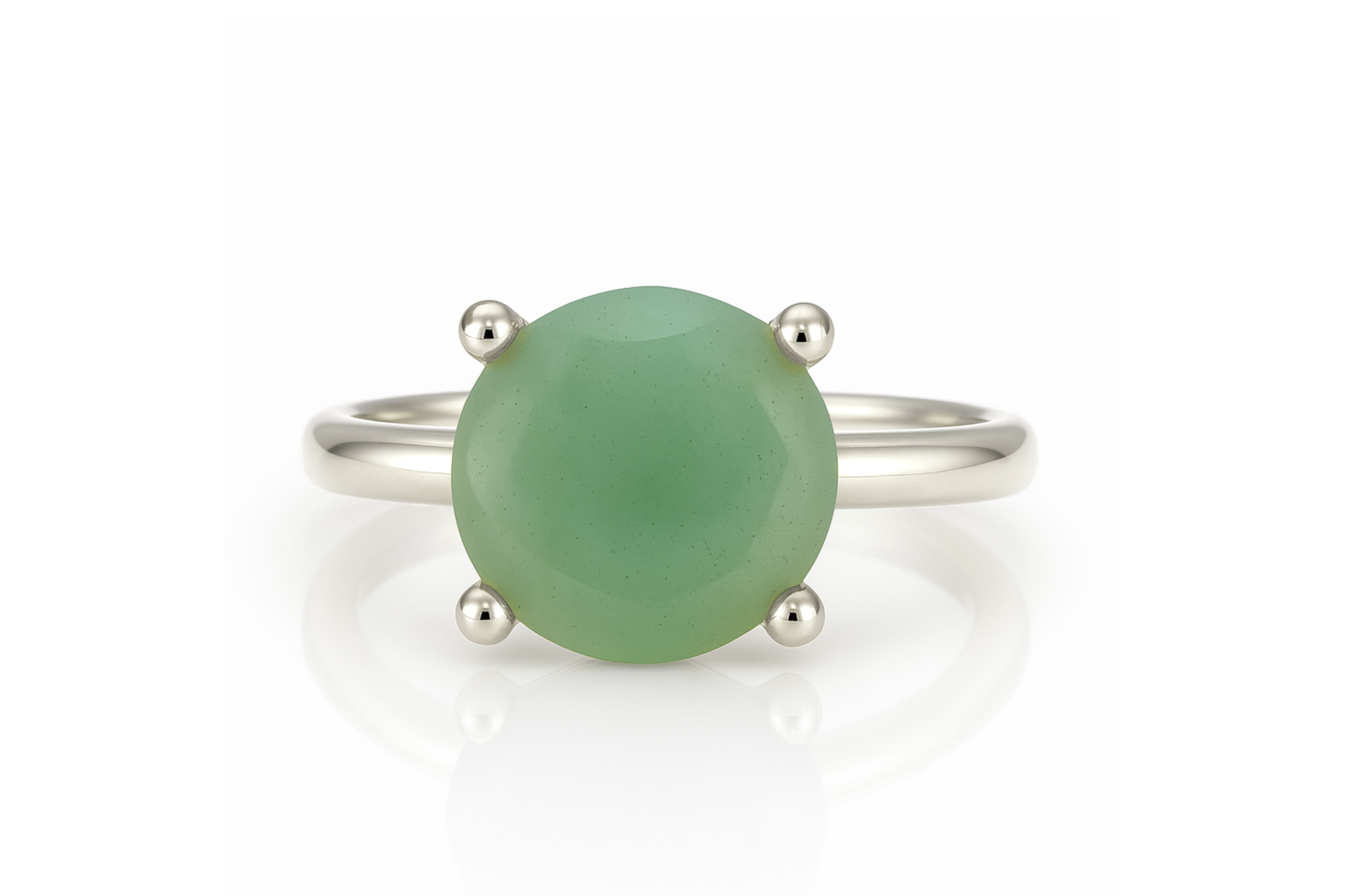 a ring with a green stone on it
