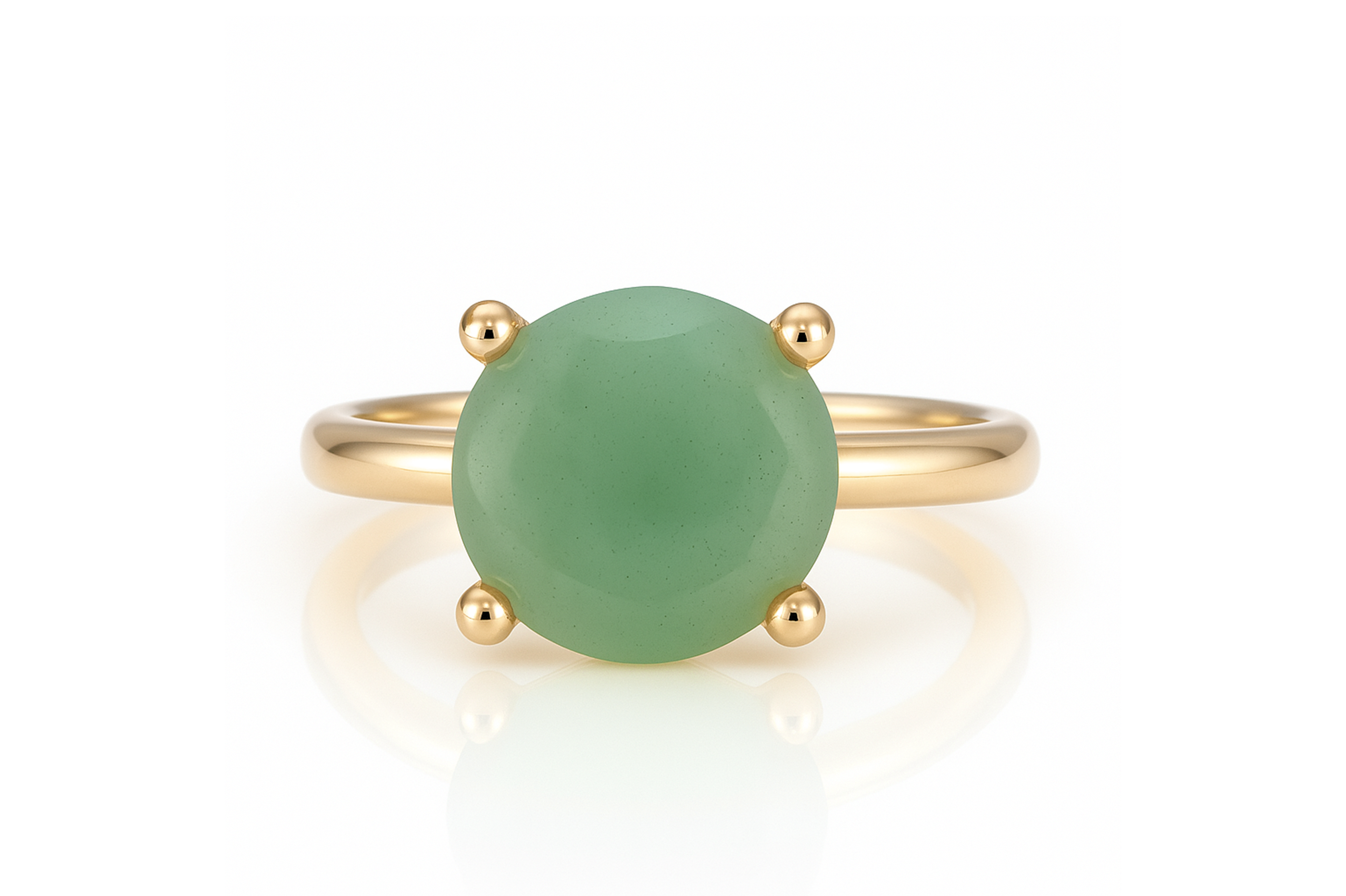 a ring with a green stone on top of it