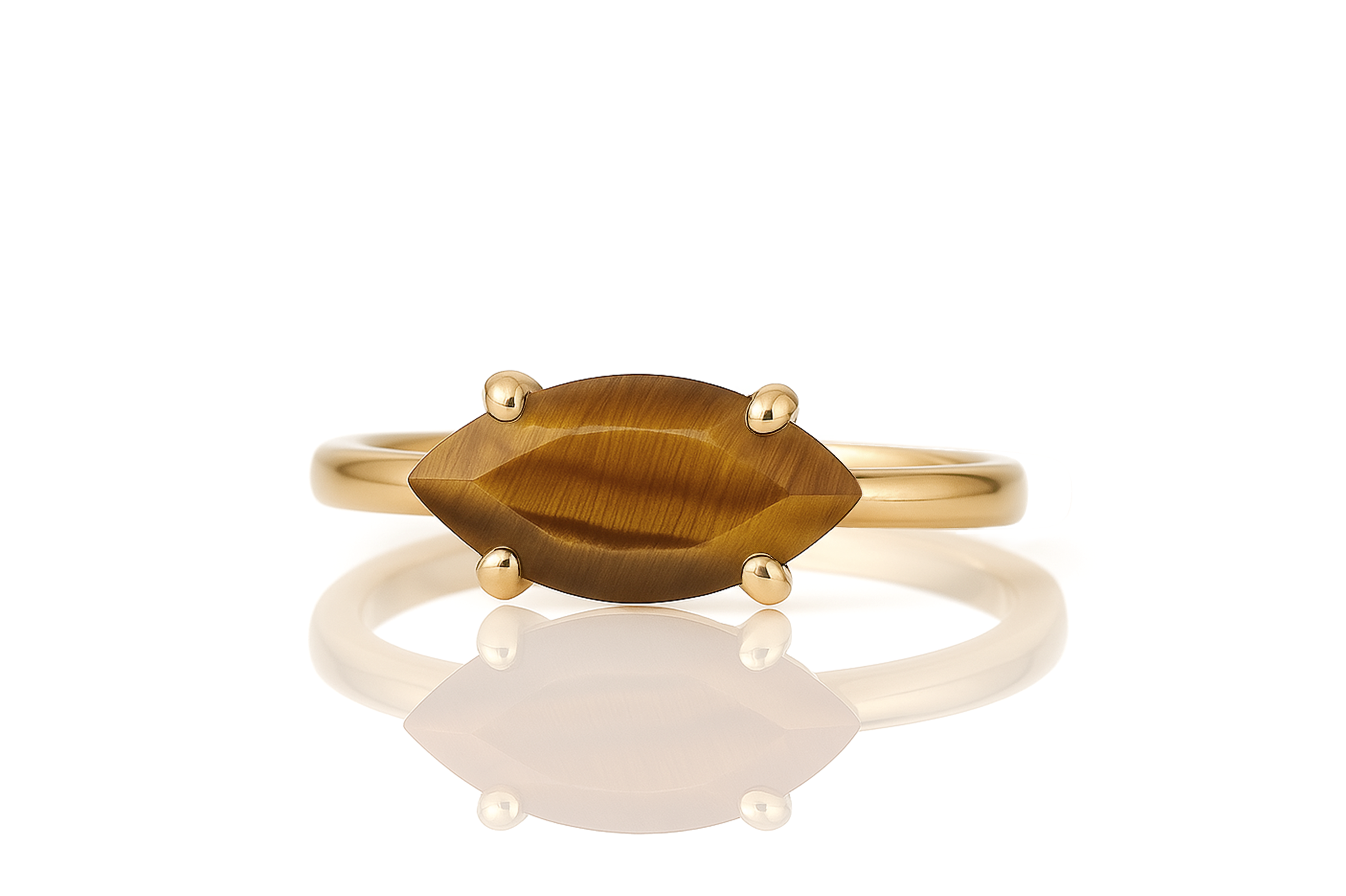 a yellow gold ring with a brown stone