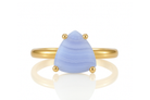 a gold ring with a blue stone on it