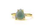 a gold ring with a green stone on it