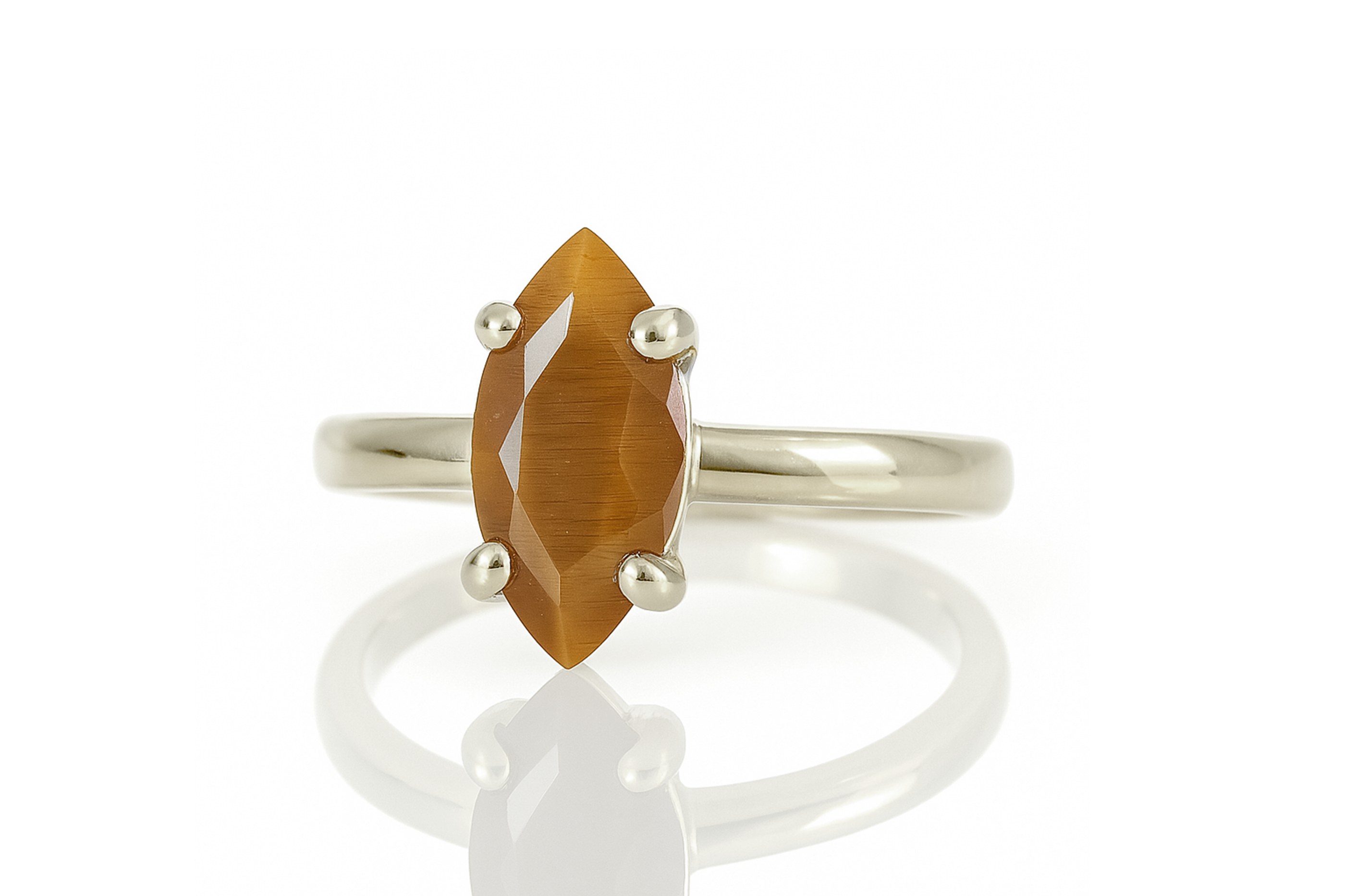 a ring with an orange stone on it
