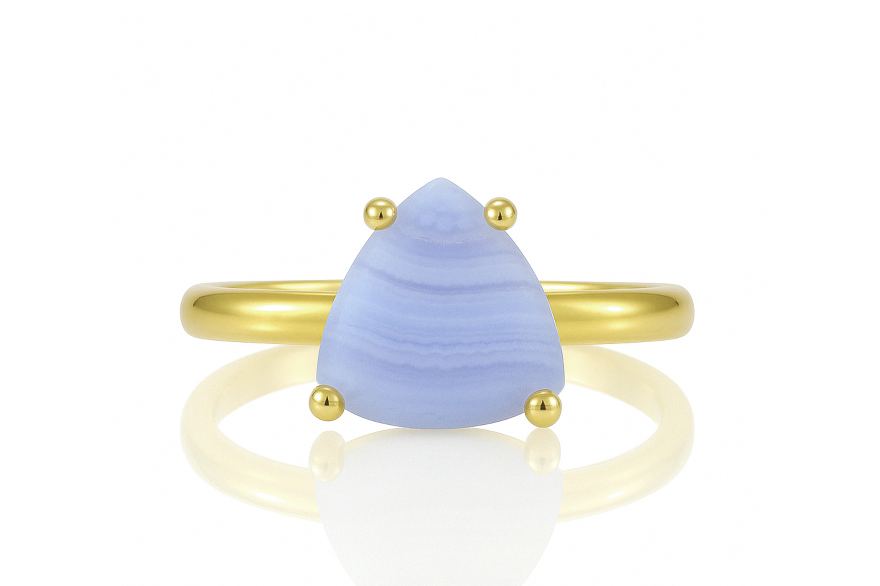 a yellow gold ring with a blue stone